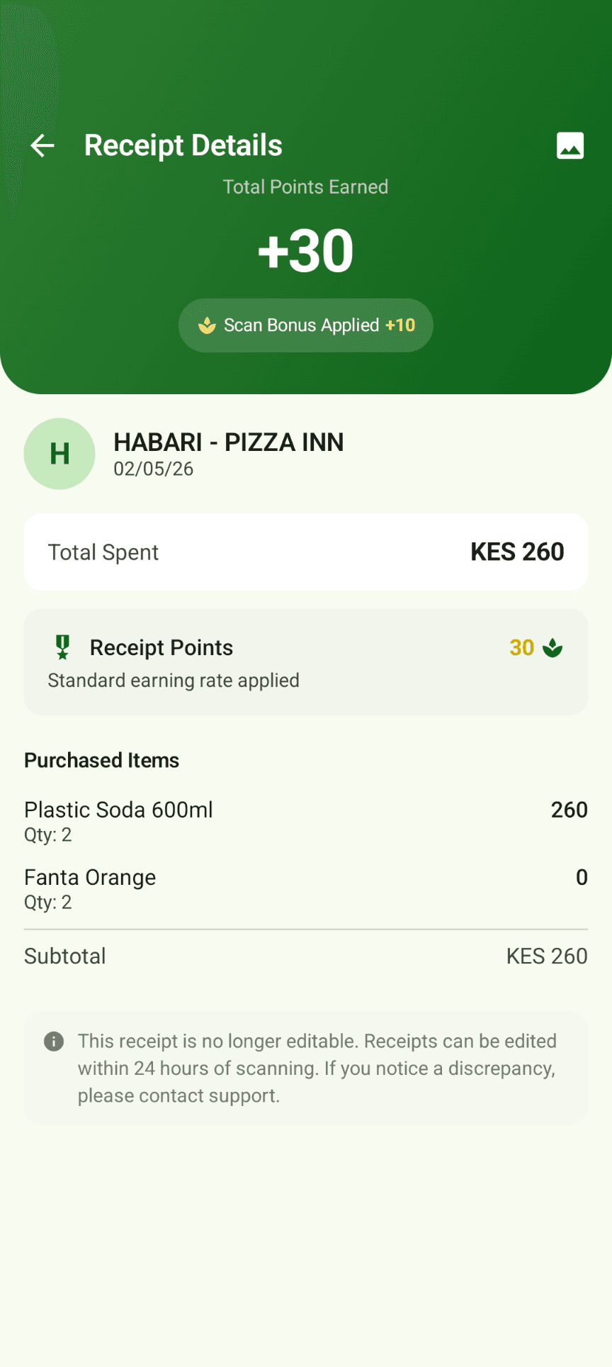 The Kacha app showing a scanned receipt: the merchant, the items bought, the total spent and the points earned.